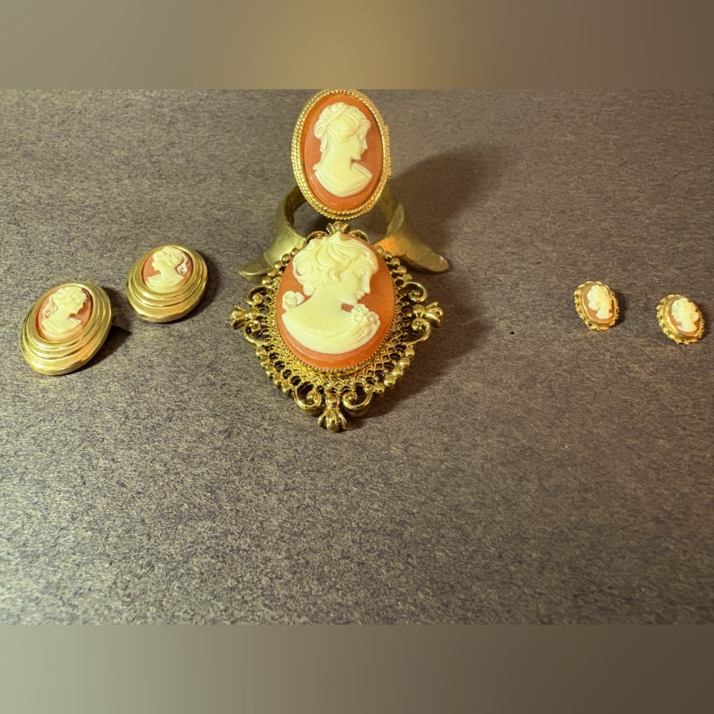 Cameos. Set of vintage Avon cameos. 2 pair earrings, ring, and brooch/necklace.